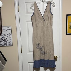 Elegant Beige Midi Dress with Blue Floral Design